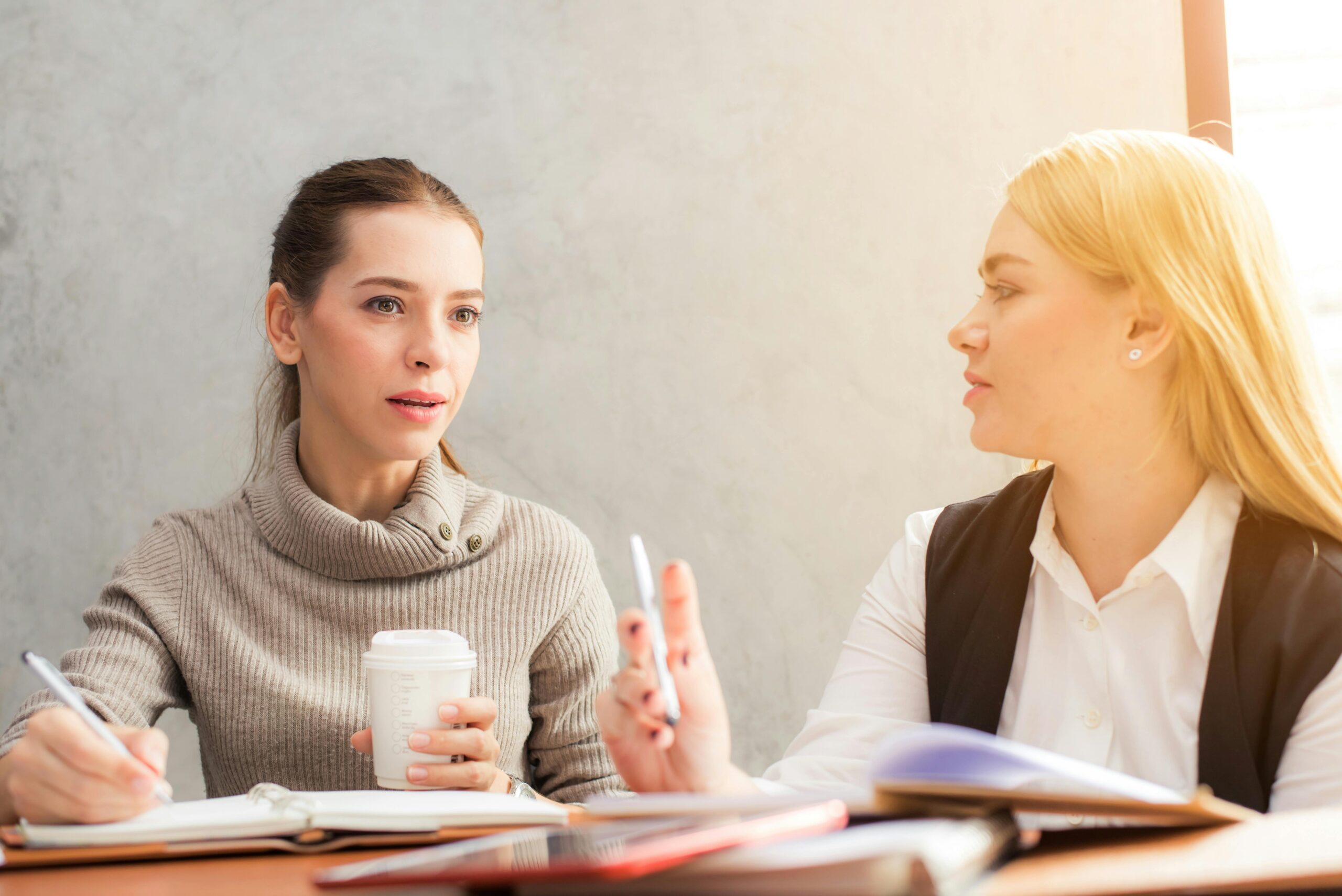 two women talking about professional development goals
