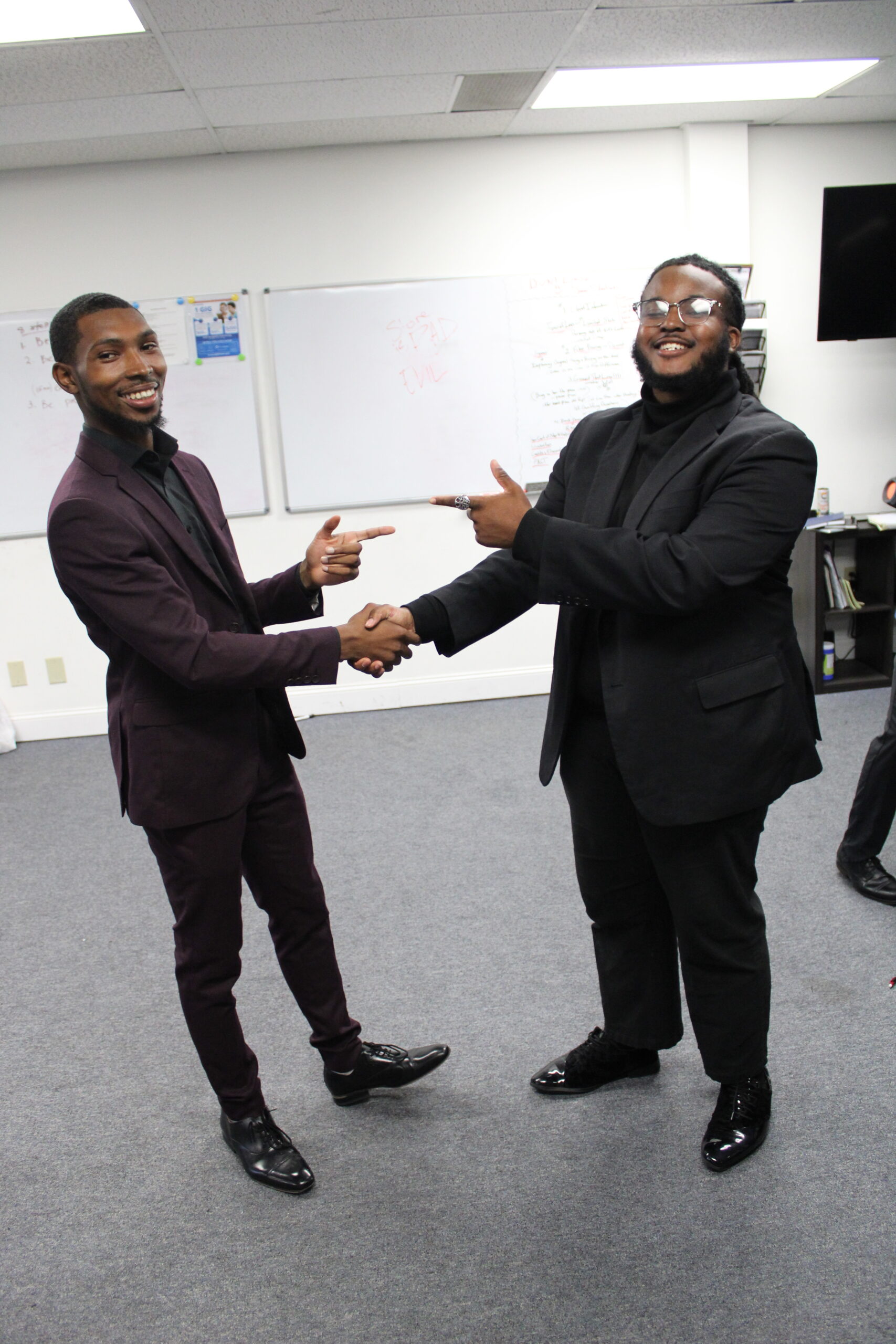 A business consultant shaking hands with another consultant